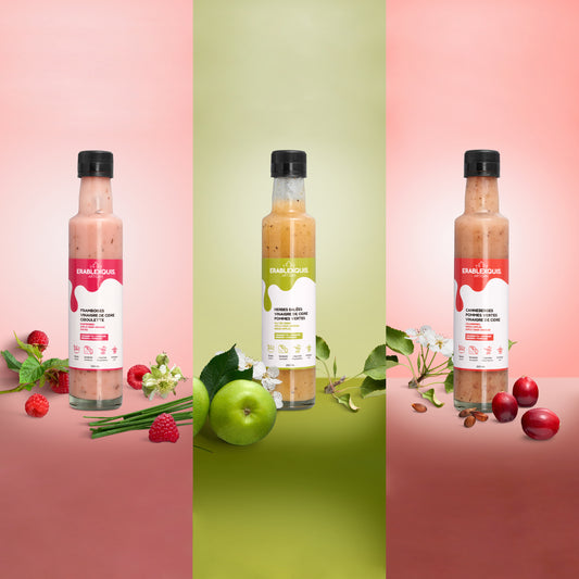Vinaigrette / marinade québécoise Érablexquis Trio Fruité – Framboises Vinaigre de cidre Ciboulette, Herbes salées Vinaigre de cidre Pommes vertes, Canneberges Pommes vertes Vinaigre de cidre. Produit naturel, local, fait de sirop d’érable pur, gastronomique, sans gluten et végétarien. Savoureux en salade, sandwich, légumes, grillade, pour des recettes rehaussées.